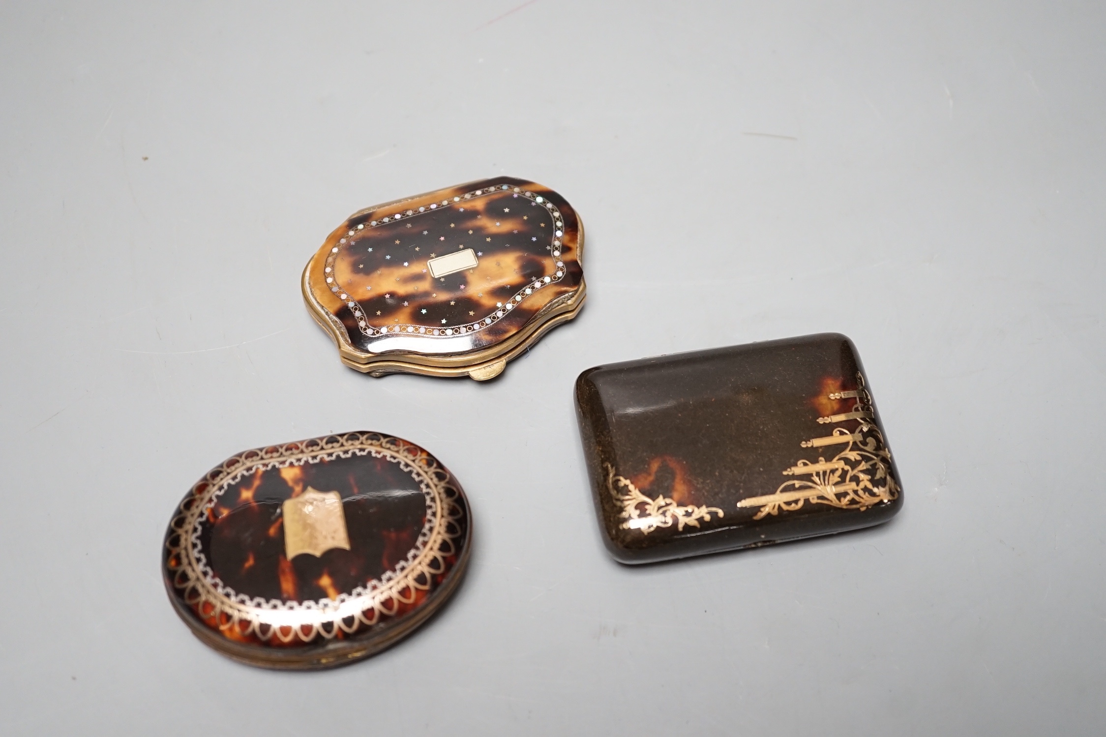 Three 19th century tortoiseshell and gilt metal purses